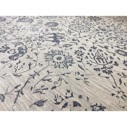 Close-up: Blue ornamental pattern on light-colored fabric, decorative lines and floral motifs