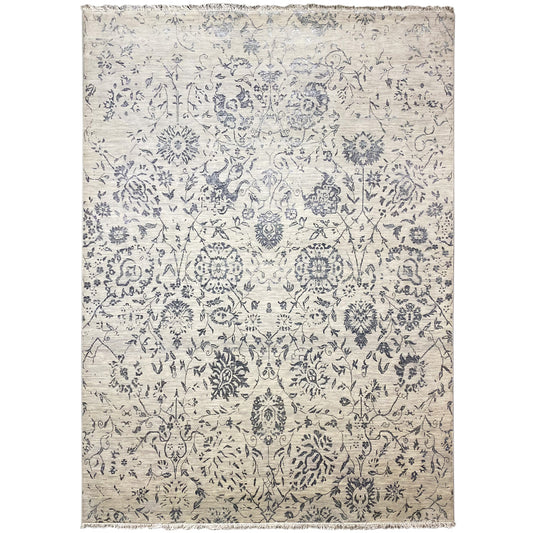 Designer rug with a blue ornamental pattern on a light background, rectangular, with bound edges