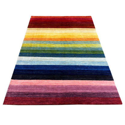 Gabbeh rug with a wide striped pattern in shades of red, yellow, green, blue, and pink