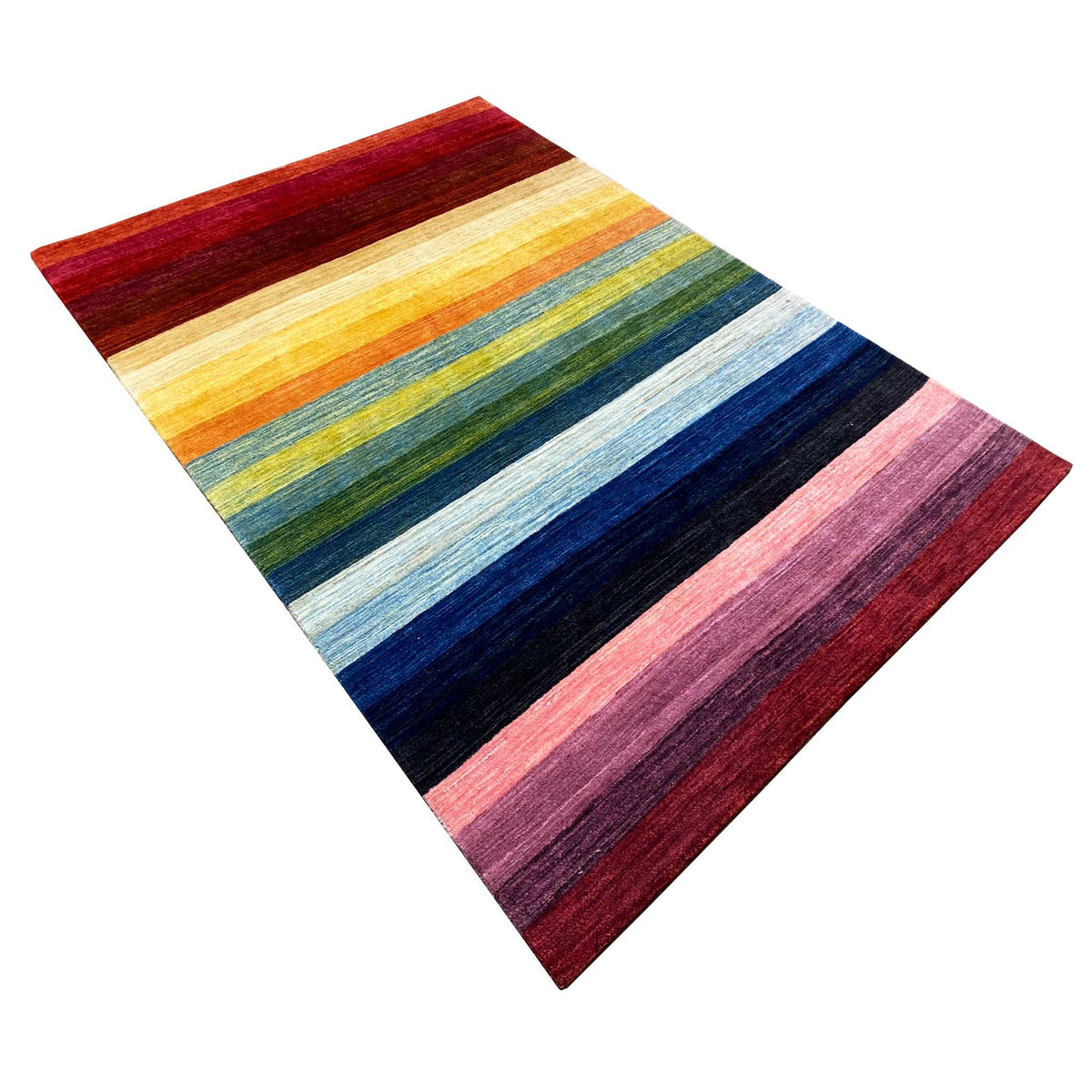 Gabbeh rug with stripes in yellow, green, blue, and red, shown at an angle