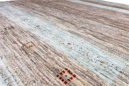 Gabbeh rug detail with fine lines and touches of brown and light blue