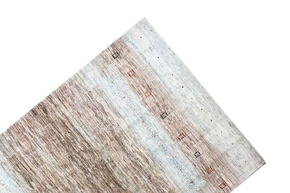 Corner Gabbeh rug: light bands and beige-brown areas