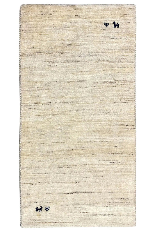 Beige Gabbeh rug with a border all around and blue animal motifs