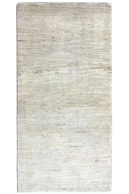 Rectangular light beige Gabbeh rug, straight edges, fine lines, and even texture