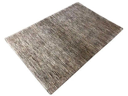 Rectangular rug with a mottled gray-brown woven pattern and short pile