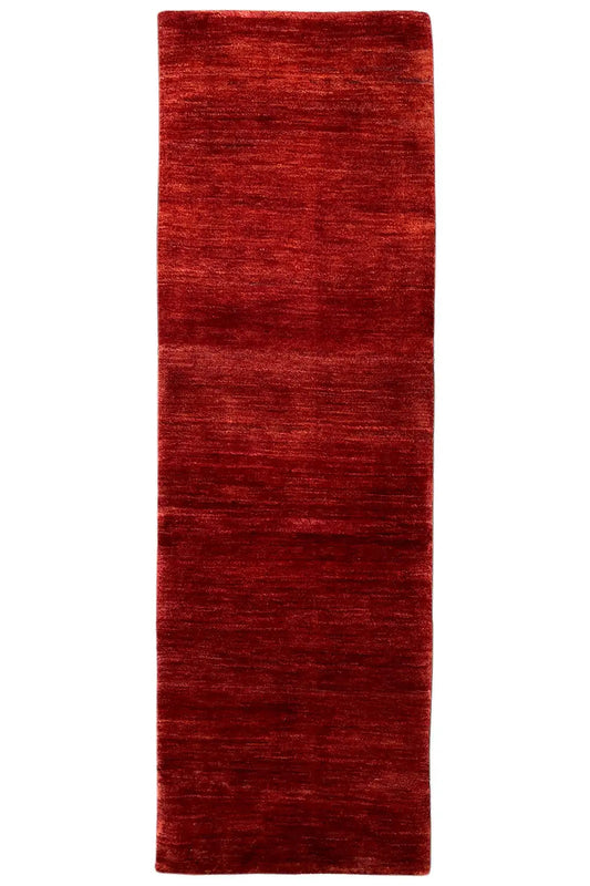 Reddish-brown Gabbeh runner, rectangular shape, even pile height
