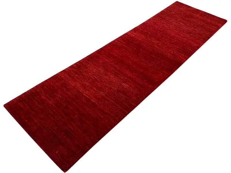 Runner rug in a vibrant red with a dense, even weave structure
