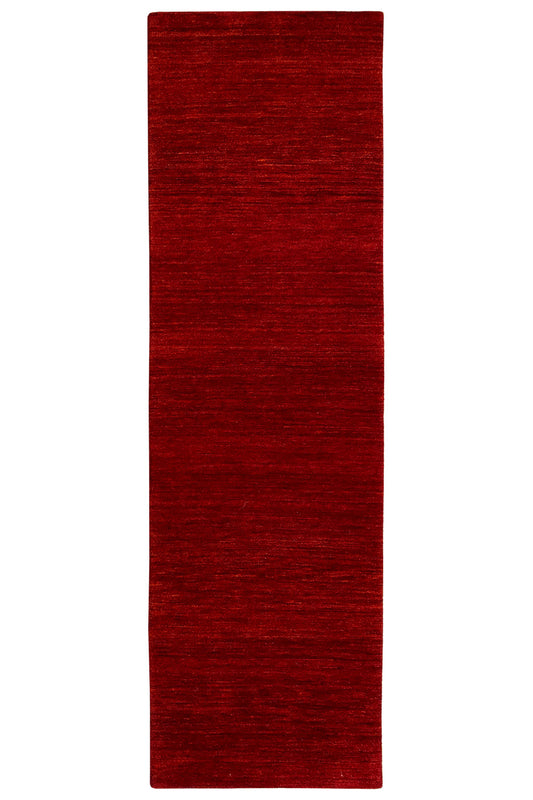 Red rectangular runner rug with a clean edge