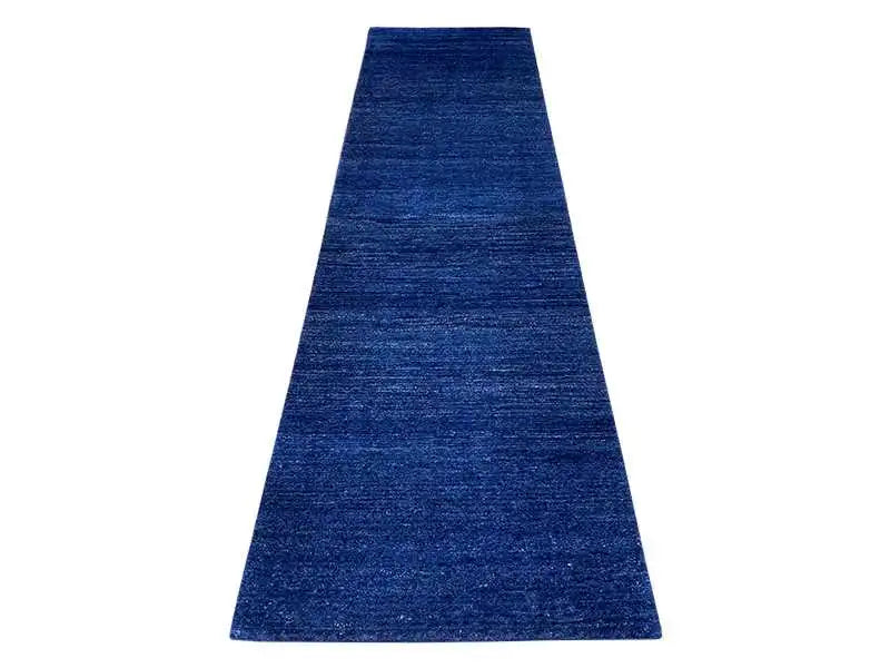 Gabbeh runner rug with a dark blue, fine texture and a calm all-over pattern