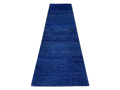 Gabbeh runner rug with a dark blue, fine texture and a calm all-over pattern