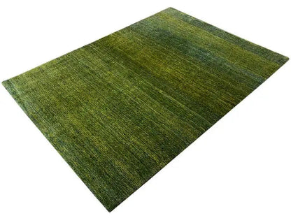 Gabbeh rug, green design with mottled pile and a rectangular shape
