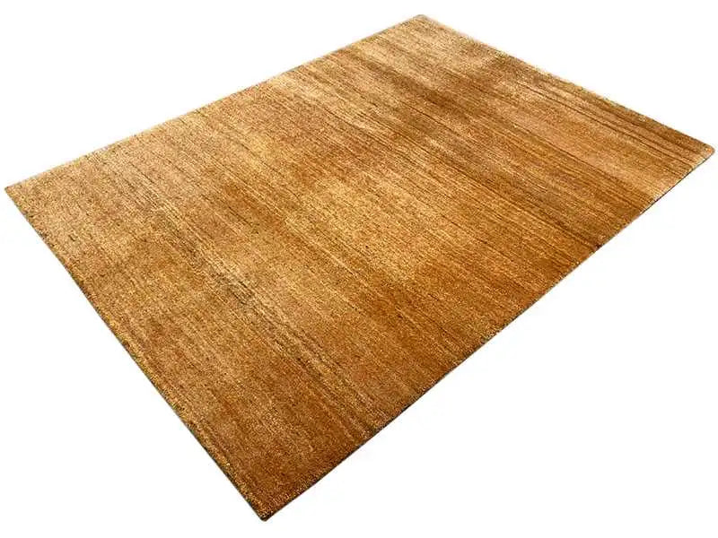 Gabbeh rug in honey brown with contrasting, textured lines