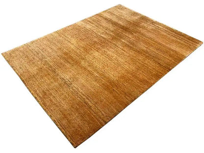 Gabbeh rug in honey brown with contrasting, textured lines