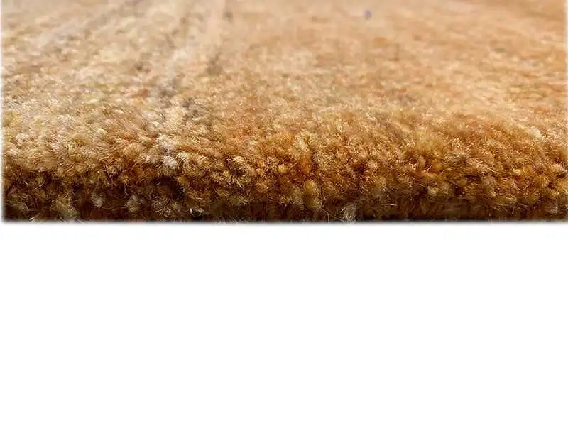 Gabbeh rug detail: brown pile fabric with a dense, even surface