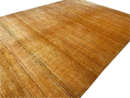 Gold Gabbeh rug, close-up of the surface with elongated light and dark strokes