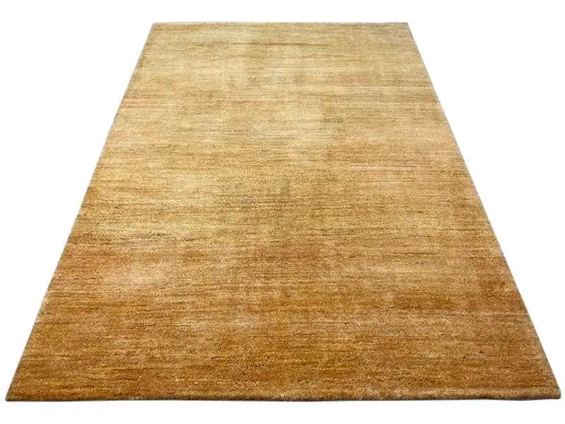 Gabbeh rug 237x168 cm, golden-brown pile with subtle shading.