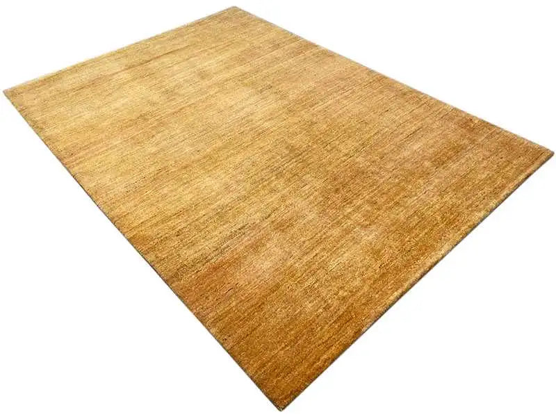 Gabbeh rug 237x168 cm, golden-brown, simple all-over design with a patterned texture.