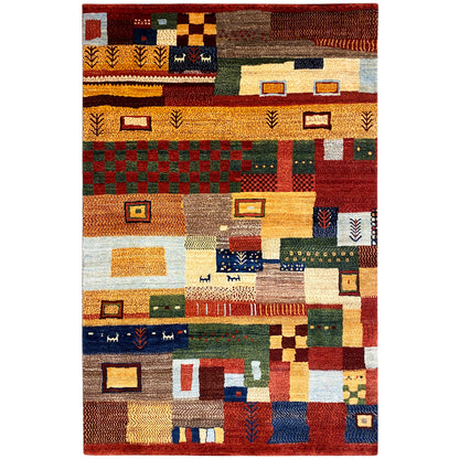 Hand-knotted Gabbeh rug with geometric patchwork in red, yellow, blue, and green