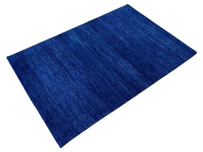 Blue Gabbeh rug 150x100 cm, rectangular, blue mottled surface
