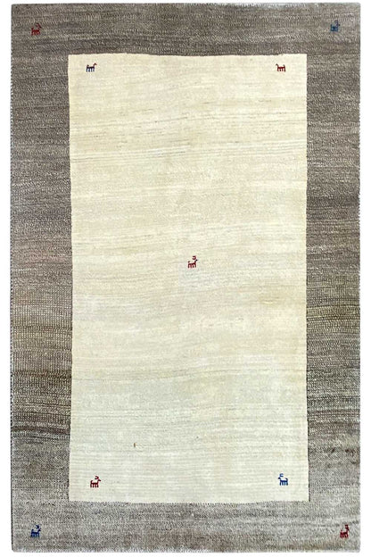 Rectangular Gabbeh rug: beige center, gray border, and subtle colorful symbols