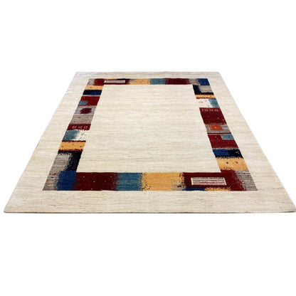 Hand-knotted Gabbeh rug with a cream-colored central field and multicolored border pattern