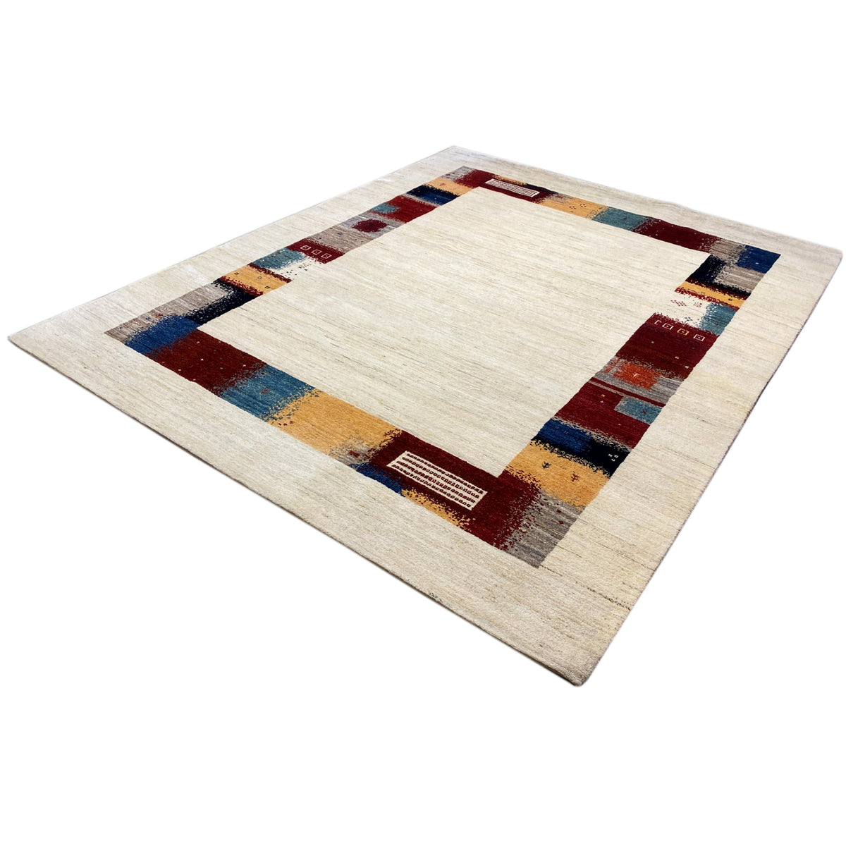 Hand-knotted Gabbeh rug with a cream-colored central area and a colorful decorative border