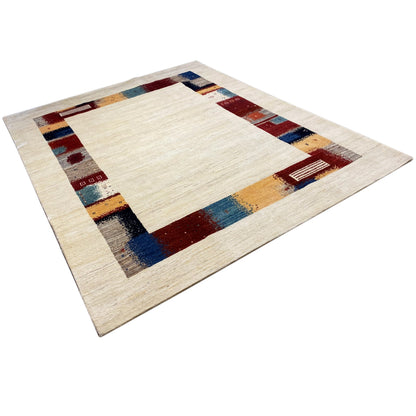 Hand-knotted Gabbeh rug with a rectangular central motif in cream and colorful border elements