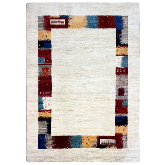 Hand-knotted square Gabbeh rug with a cream-colored central motif and multicolored corner border