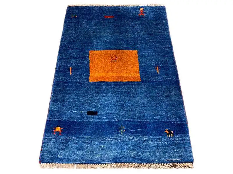 Blue Gabbeh rug with an orange rectangular pattern and colorful details, with fringes