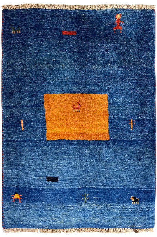 Blue Gabbeh rug with an orange rectangular pattern and colorful figures, with fringes all around