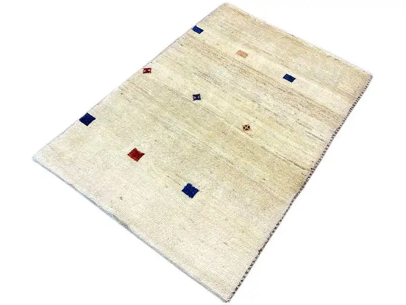 Gabbeh rug 119x84 cm, light beige with a square pattern in blue and red, bound edges