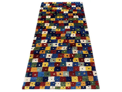 Gabbeh rug 150x79 cm, rectangular, blue patchwork pattern with red, yellow, and white squares.
