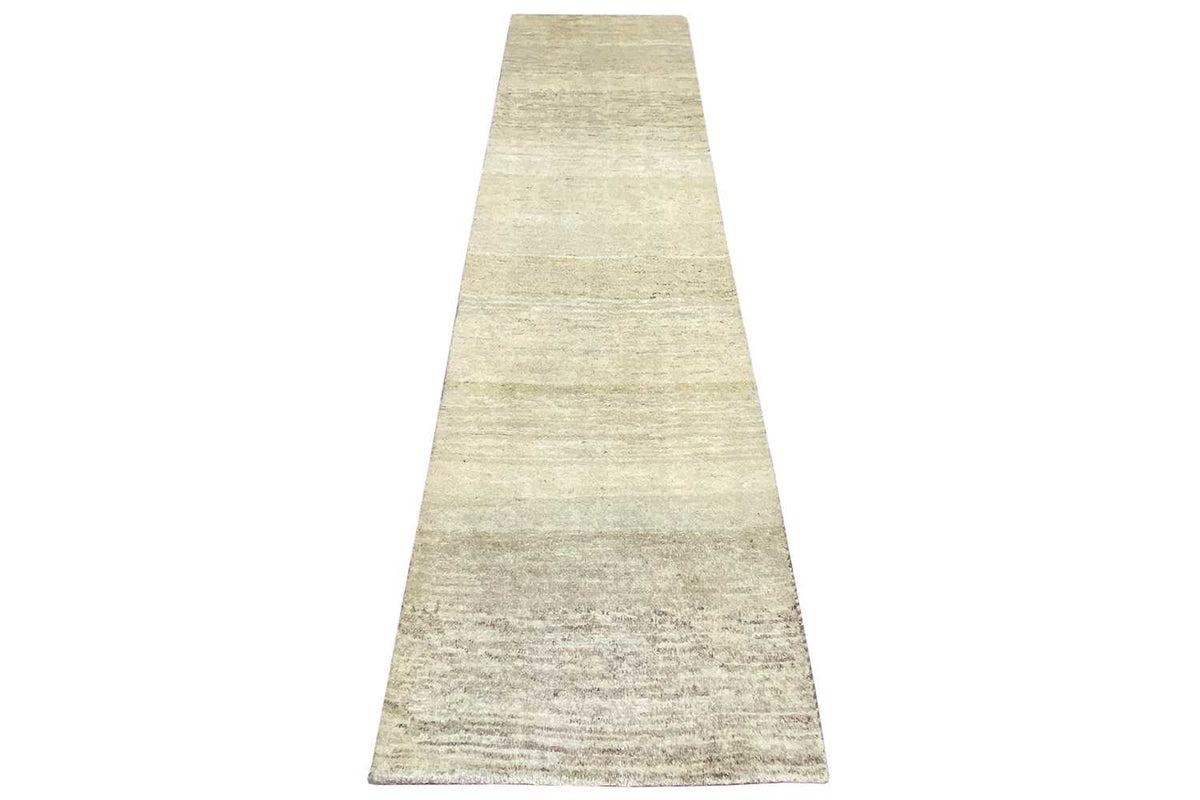 Gabbeh rug with a visually tapered shape, light beige mottled surface, 299x84 cm