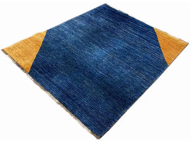 Blue carpet with yellow triangles along the edges, appearing square-shaped