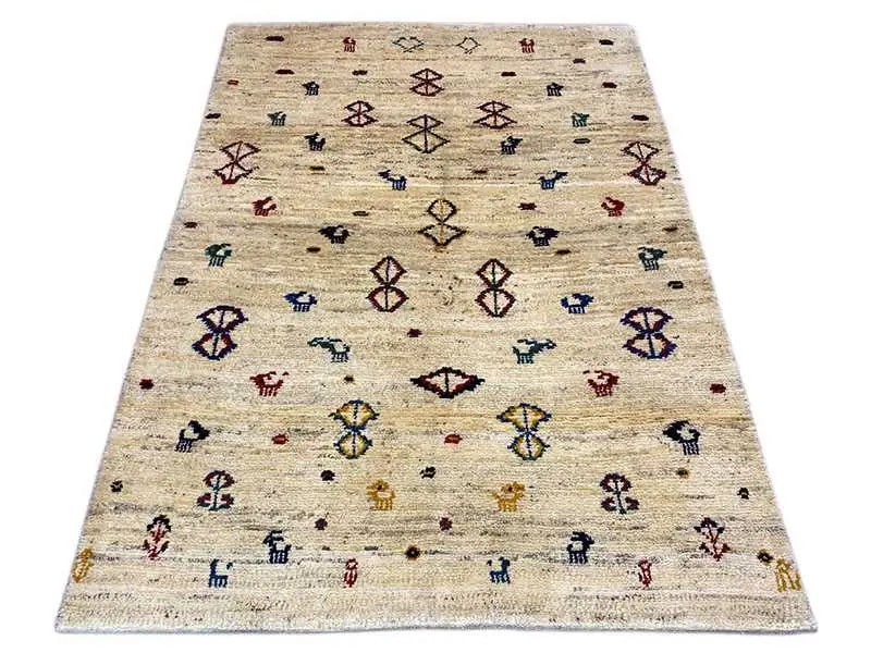Gabbeh rug 164x116 cm in light beige with colorful decorative motifs and diamonds