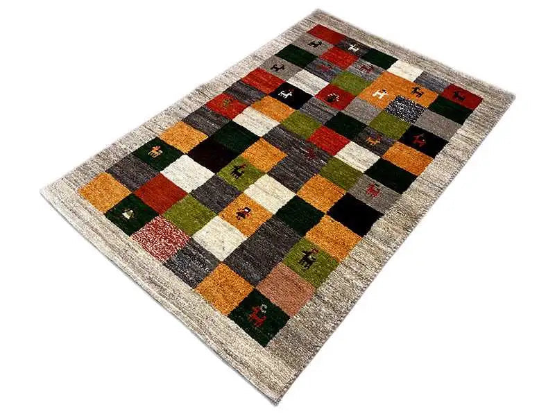 Gabbeh rug (149x96 cm) with a checkered pattern of colored fields and small animal images
