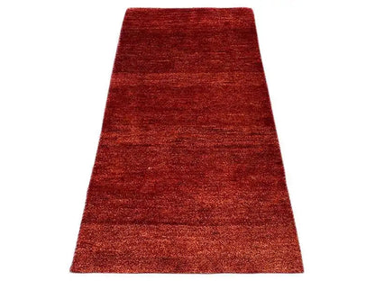 Gabbeh rug, red flat-woven rug with an even pattern, rectangular