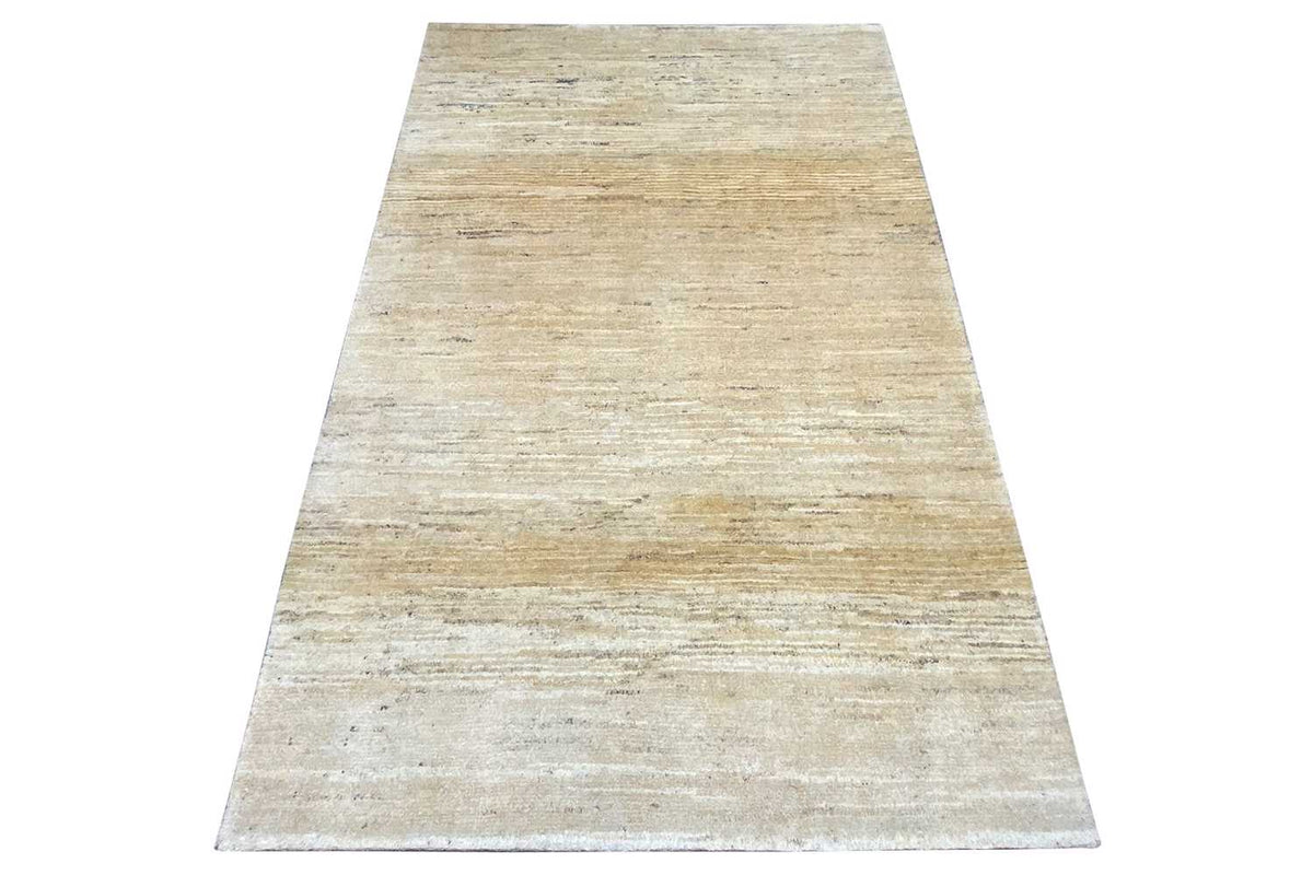 Gabbeh rug (184×118 cm) laid flat, even texture with subtle stripes