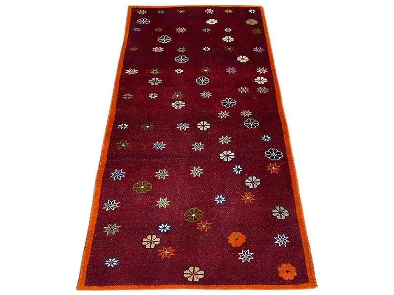 Gabbeh rug with colorful floral pattern, dark red, orange border (170x87 cm)