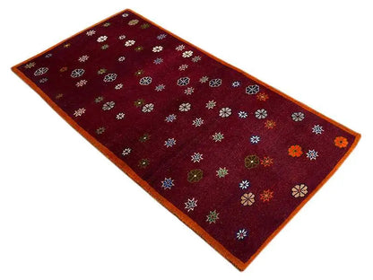 Gabbeh rug, dark red floral pattern with multicolored border, 170x87 cm