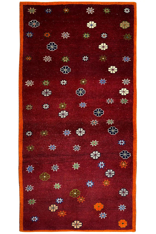 Rug with colorful flowers in a grid, dark red, orange decorative border (170x87 cm)
