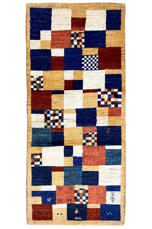 Rectangular Gabbeh rug with a square pattern in blue, white, and brown