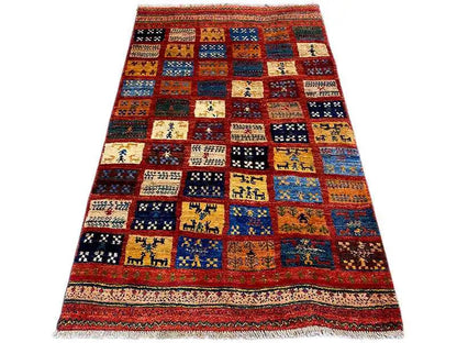 Gabbeh rug with colorful patchwork fields and border, rectangular, fringed edges
