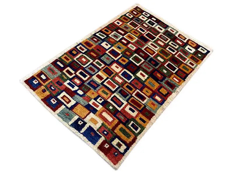 Rectangular Gabbeh rug, colorful square pattern with a dark border