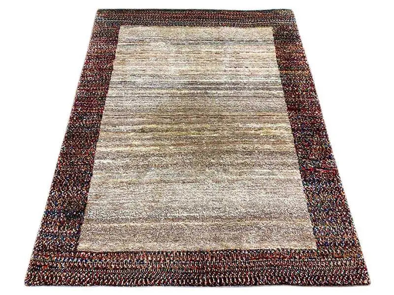 Gabbeh rug 142x107 cm with a beige central stripe and dark mottled border edge
