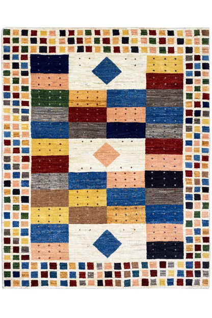 Gabbeh rug with geometric patchwork in blue, red, yellow, and beige