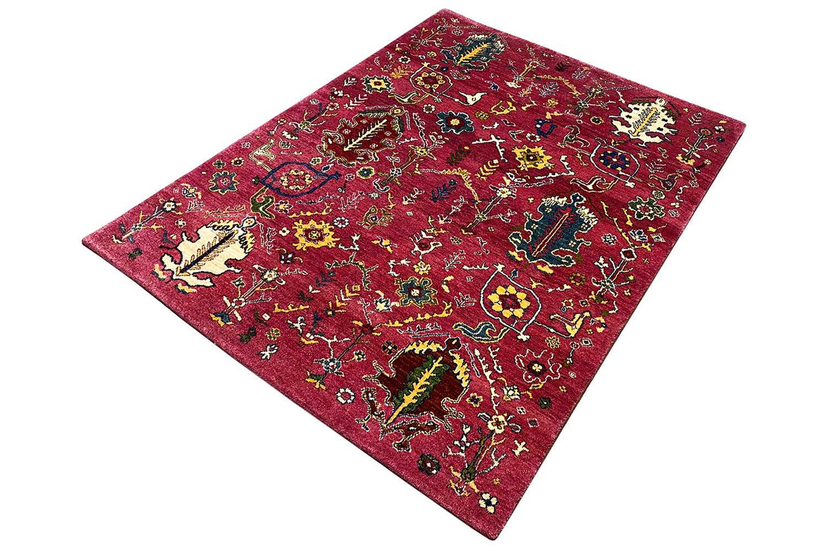 Red Gabbeh rug with colorful details, additional angled view