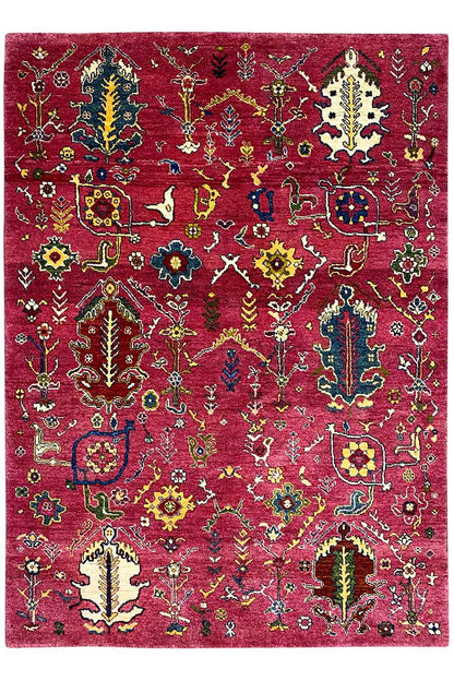 Red Gabbeh rug with colorful ornaments, front view