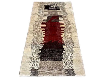 Gabbeh rug with a beige background, red central motif, and black patterned stripes, 168x91 cm