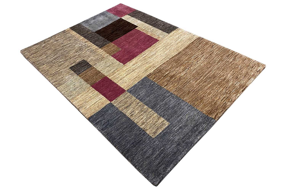 Rug with a geometric block pattern in beige, dark gray, and burgundy